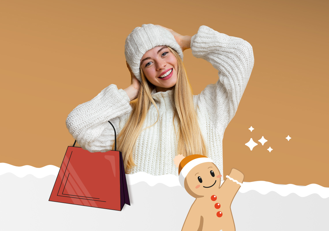 Women with hat, shopping bag and gingerbread man