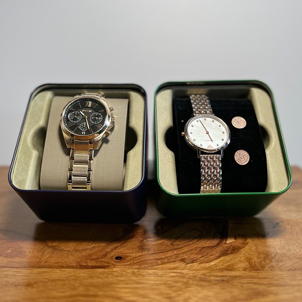 Watch from Fossil and ladies' watch from Armani plus earrings